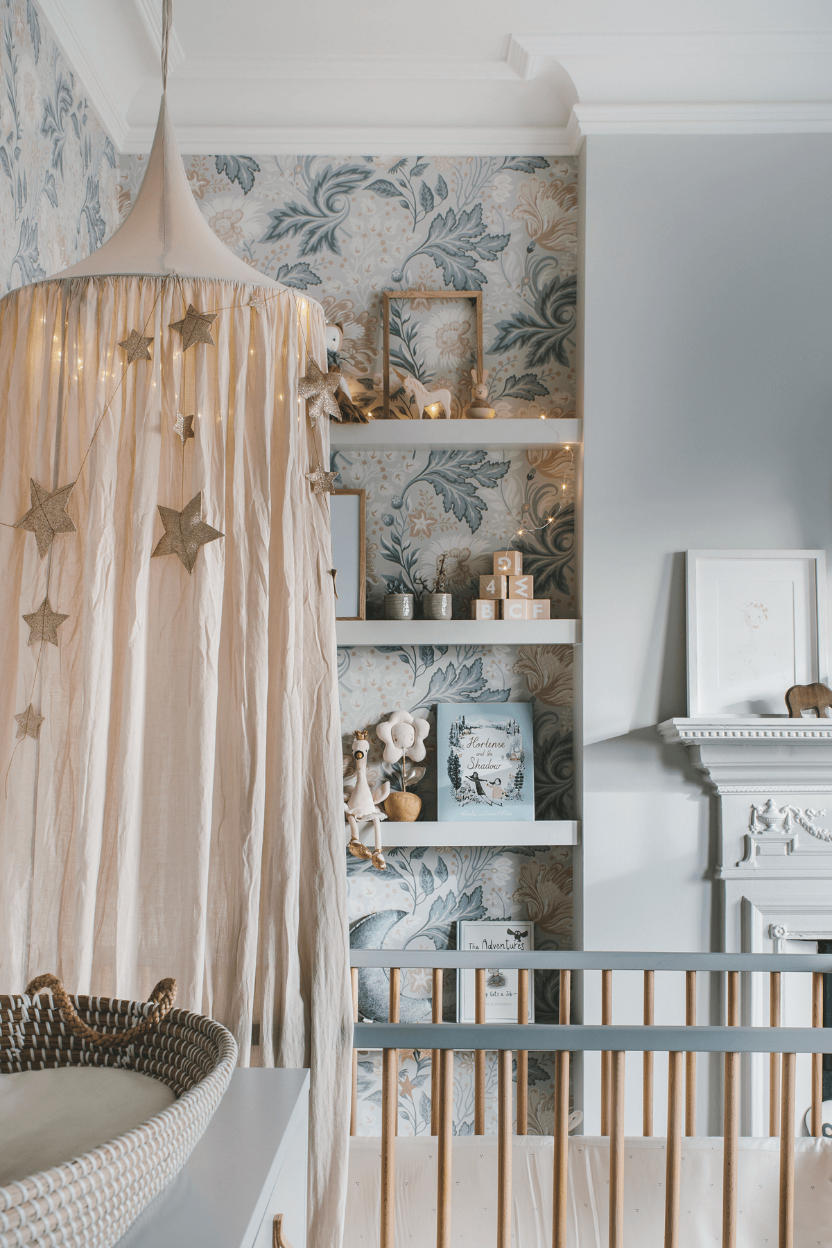 Enchanting nursery in grey and powder tones