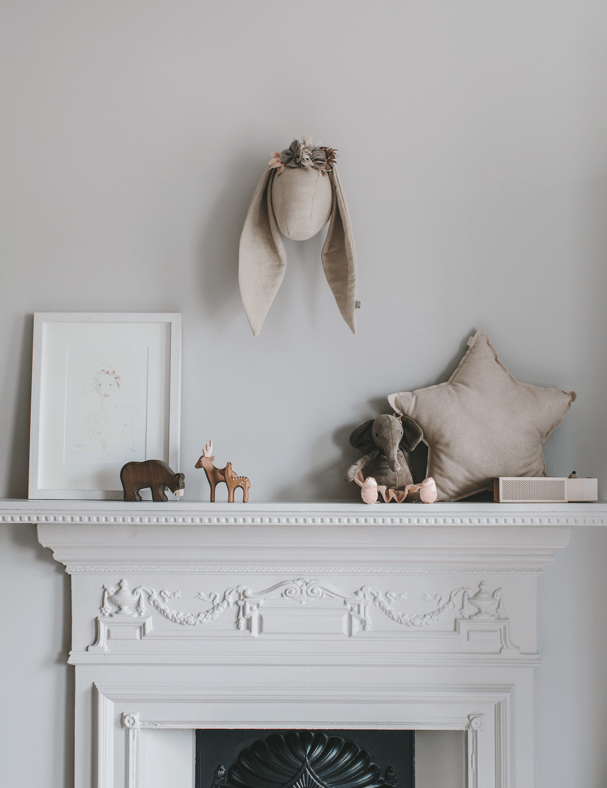 Enchanting nursery in grey and powder tones